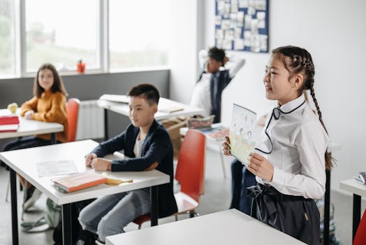 Students in a classroom engaging during a presentation, emphasizing education and learning.